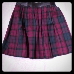 Pleated plaid skirt.